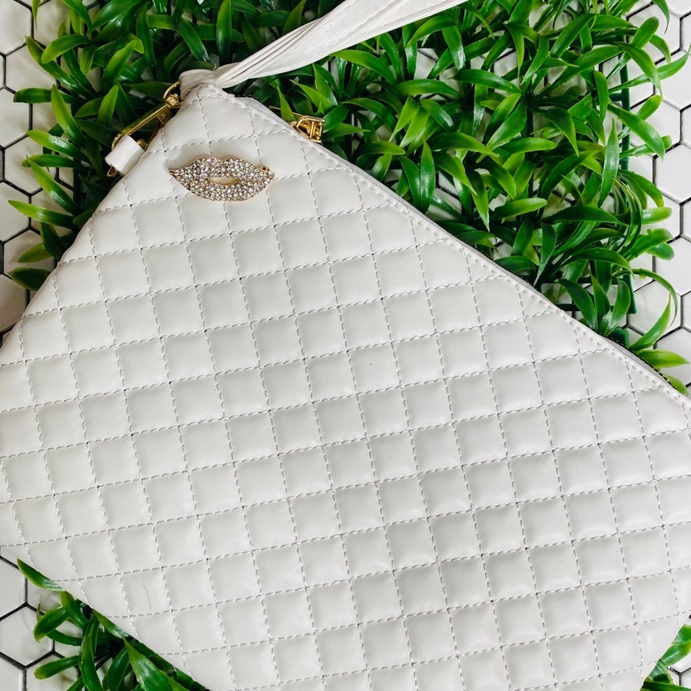 Quilted mailbag clutch with rhinestone lips